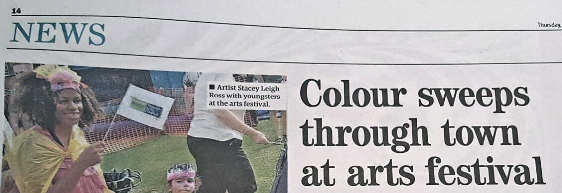 Headline for Royston Crow article about Royston Arts Festival Carnival-like parade showing image of by Leigh artist, Stacey Leigh Ross who held carnival craft workshops for the Royston Museum
