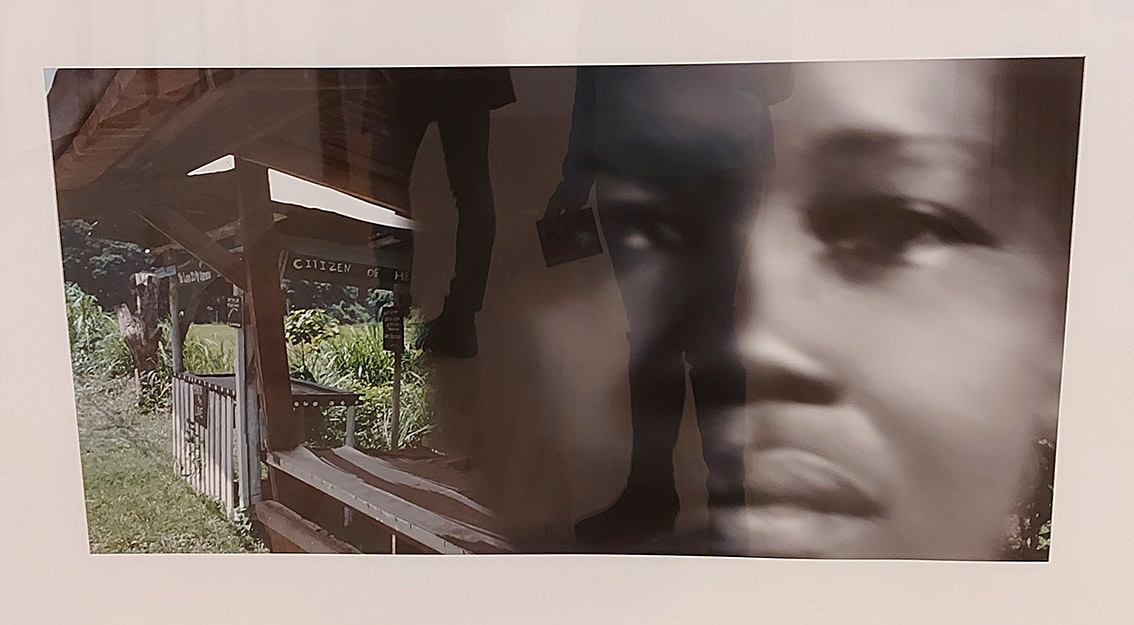 a scrappy wooden road side stall colour photo merged with a sepia toned photo of a black woman's face