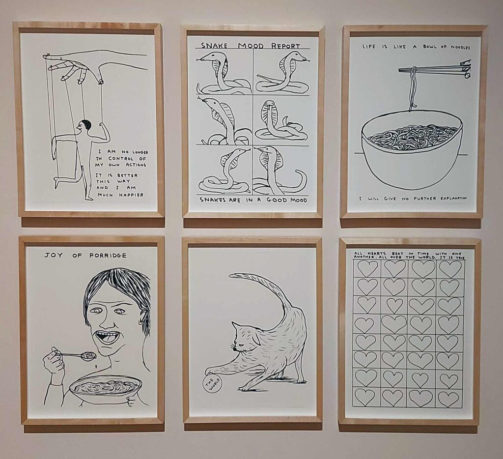 6 wood framed line drawings, black ink on cream paper of different scenes, cartoons and ideas of joy